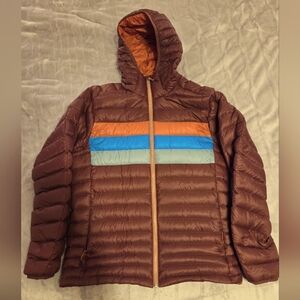 Cotopaxi Brown Puffer Jacket with Orange and Blue Accents